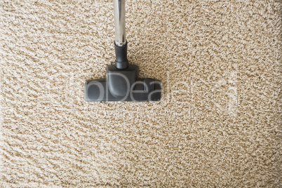Hoovering the carpet