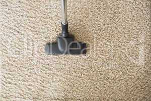 Hoovering the carpet