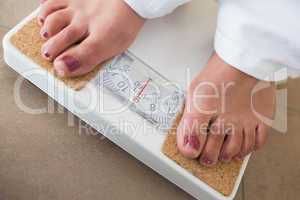 Womans feet on scales