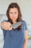Woman holding knife out