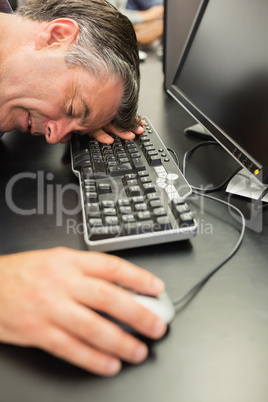 Man asleep on keyboard