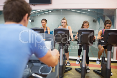 Man instructs spinning class