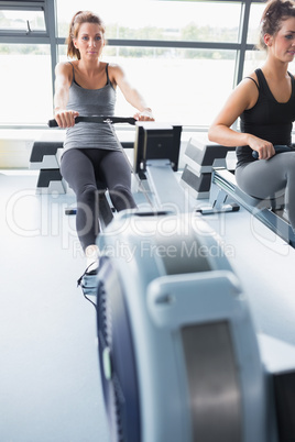 Woman using rowing machine