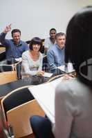Man asking question in lecture