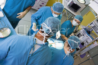 High angle view of a group of surgeons