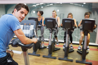 Male instructor at spinning class