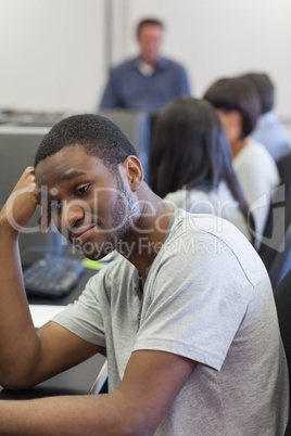 Man turning away from computer class