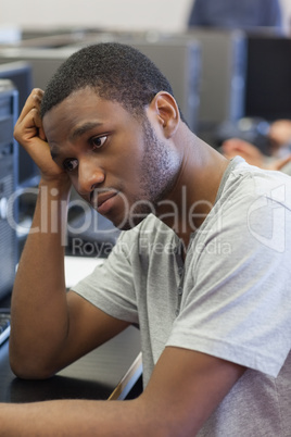 Student looking upset in computer room