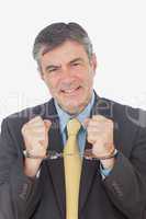 Businessman with handcuffed hands