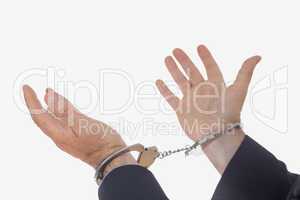 Close-up of hands with handcuffs