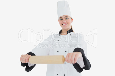 Happy female chef with rolling pin Happy female chef with rolling pin