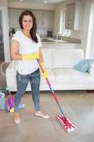 Woman holding a mop