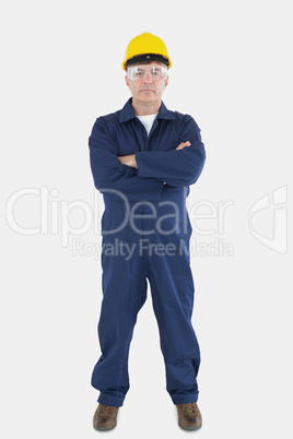 Confident technician wearing hardhat and eyewear