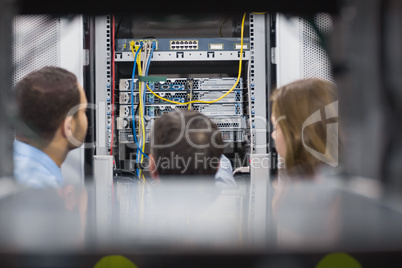 Technicians viewing a server