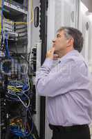 Technician searching for a solution in the server case