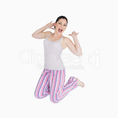Yawning woman in pyjamas