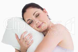Woman sleeping on her pillow