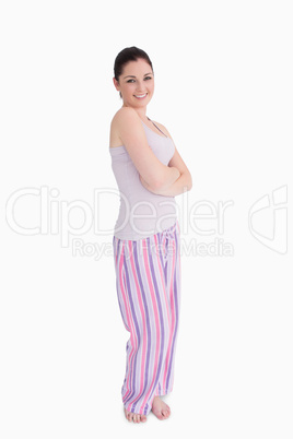 Woman standing in pyjamas