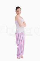 Woman standing in pyjamas