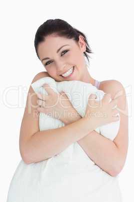 Woman holding a pillow