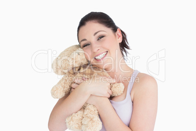 Woman holding a teddy bear