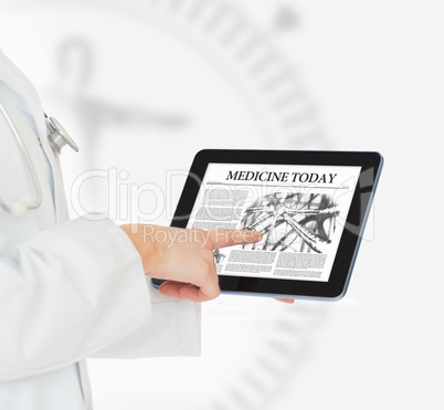 Doctor pointing on digital tablet