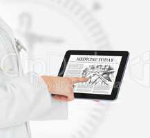 Doctor pointing on digital tablet