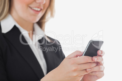 Close-up of business woman using cell phone