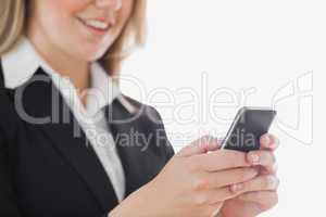 Close-up of business woman using cell phone