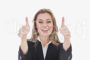 Happy business woman gesturing thumbs up