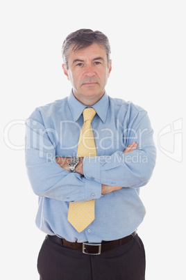 Portrait of businessman with arms crossed