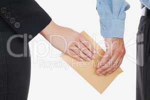 Business people holding an envelope