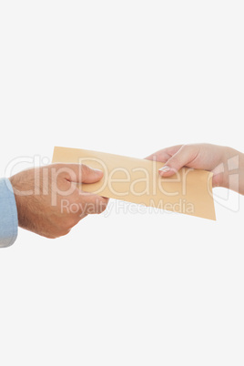 Business people holding envelope