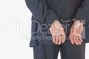 Businessman in handcuffs