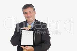 Businessman displaying digital tablet