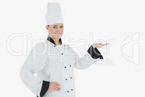 Female chef holding out your product