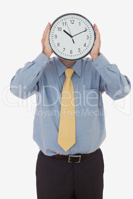 Businessman with clock  face