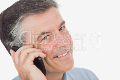 Portrait of businessman using cell phone