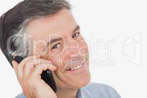 Portrait of businessman using cell phone