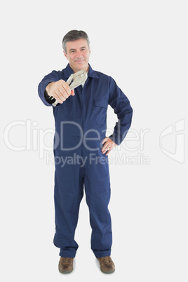 Mechanic holding pliers