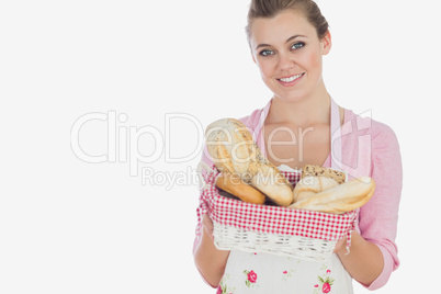 Beautiful woman holding bread basket