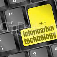 key with information technology text on laptop keyboard