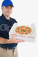 Mature delivery man holding pizza