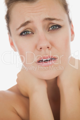 Woman suffering from neckache