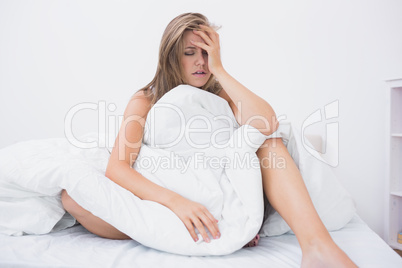 Blonde woman has just waking up