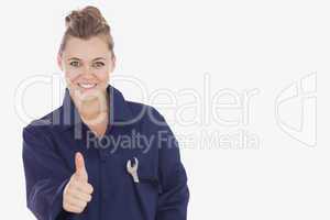 Female technician showing thumbs up sign