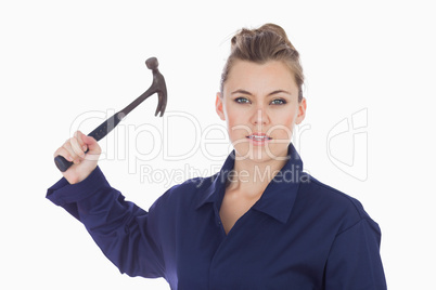 Female technician holding claw hammer