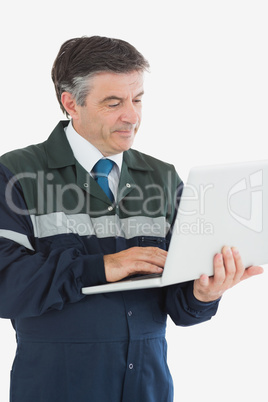 Repairman using laptop