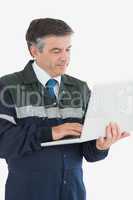 Repairman using laptop