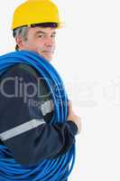 Repairman wearing hardhat with cable